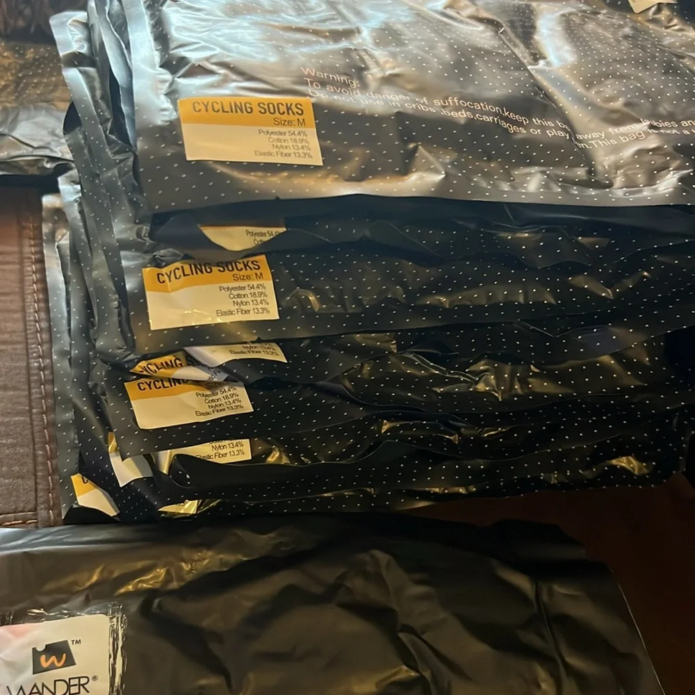 Wander cycling, socks, 2 three packs size medium.